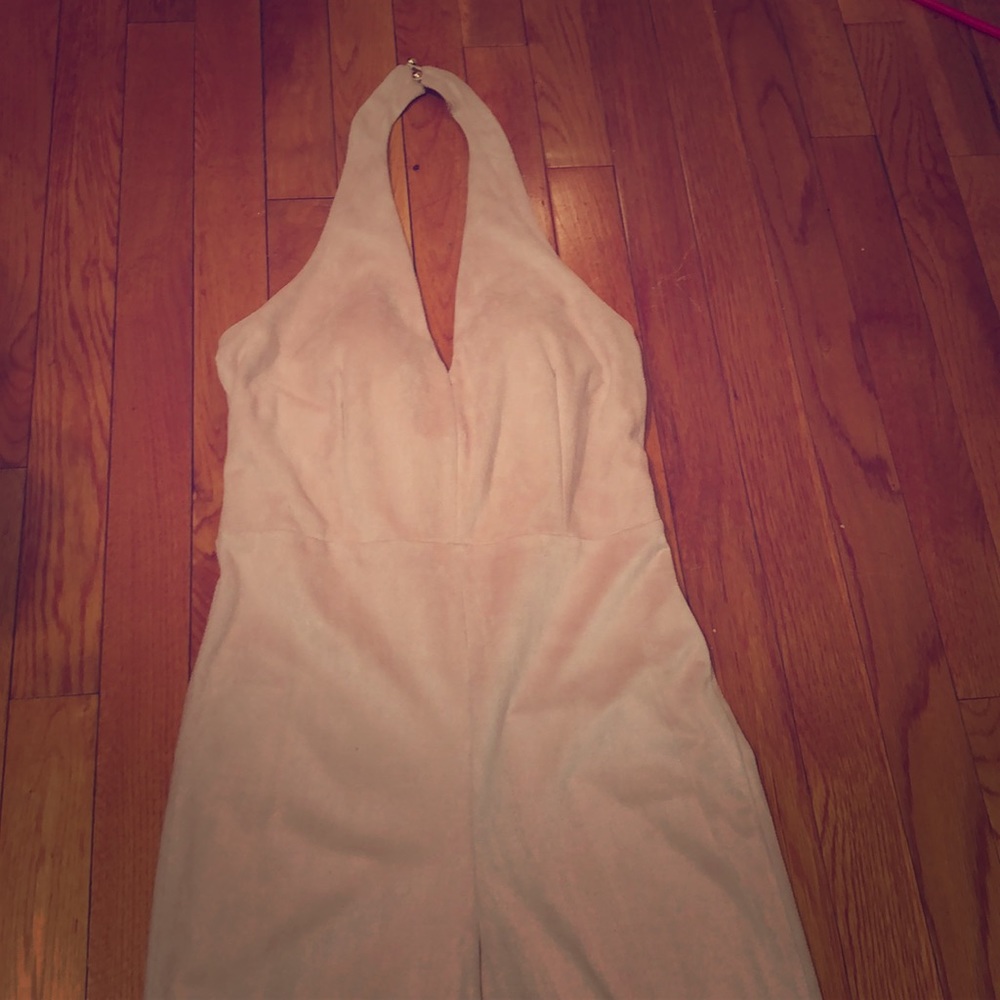 Pink suede gold button backless jumpsuit .